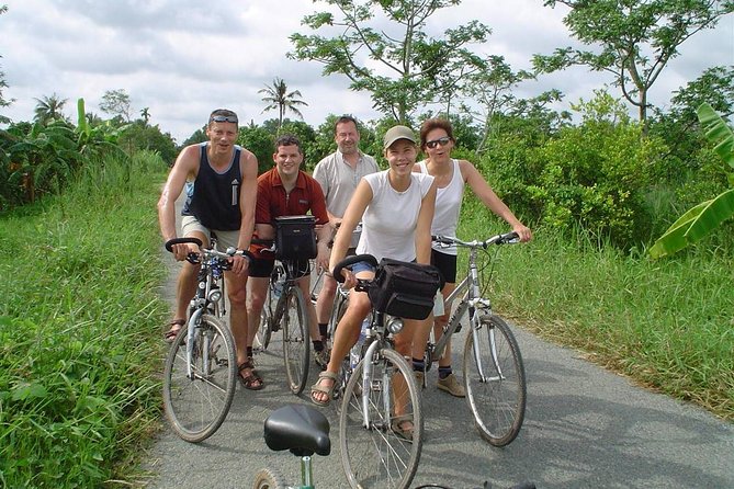 HCM:Mekong Delta Boat,Khotcake cooking Coconut Village,SmallGroup - Vinh Trang Pagoda: the one calm stop that adds depth
