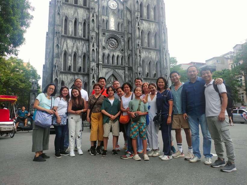 Highlight Hanoi city tour with train street. - Dong Xuan Market and Saint Joseph Cathedral, shopping energy plus colonial-era detail