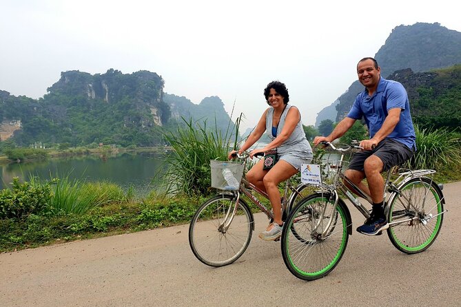 Highlight Ninh Binh Full Day Tour Tam Coc Boat, Mua Cave, Hoa Lu - Hanoi to Ninh Binh transfer: AC bus, Wi-Fi, and fewer hassles
