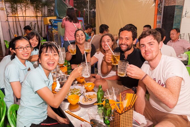 Ho Chi Minh City Street Food Tour & Sightseeing By Motorbike - District 3 first bite: Bún Bò Huế at a local noodle shop