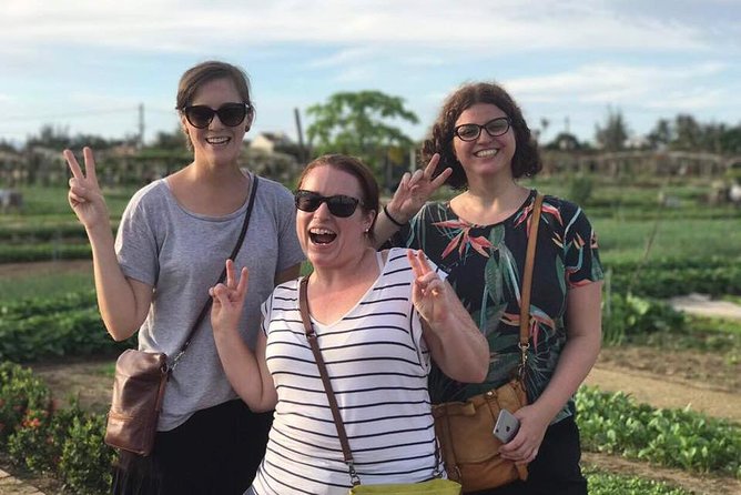 Hoi An Food Tour by Motorbike with Tastings and Dinner - Hoi An Market stop, where the sandwich story starts