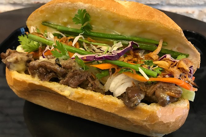Hoi An Street Food Walking Tour with Tastings - Eating with families and seeing the human side of Hoi An food