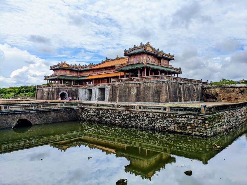 Hue: Dragon Boat, Imperial City & Royal Tombs Full-Day Tour - Minh Mang Tomb, calm lakes, gardens, and bridges