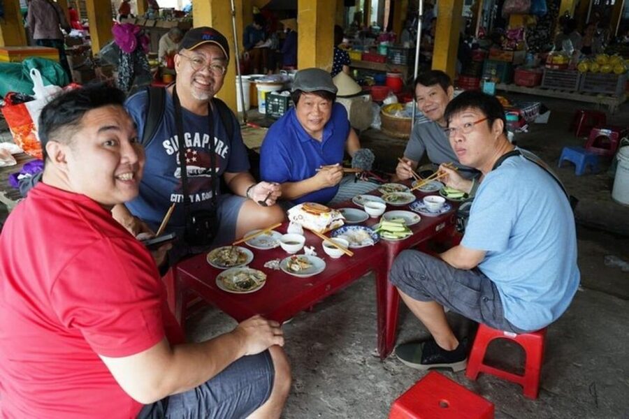 Hue: Night Street Food Tour by Cyclo with a Local Guide - The Hue River stop: com hen (tiny clams) you might never order