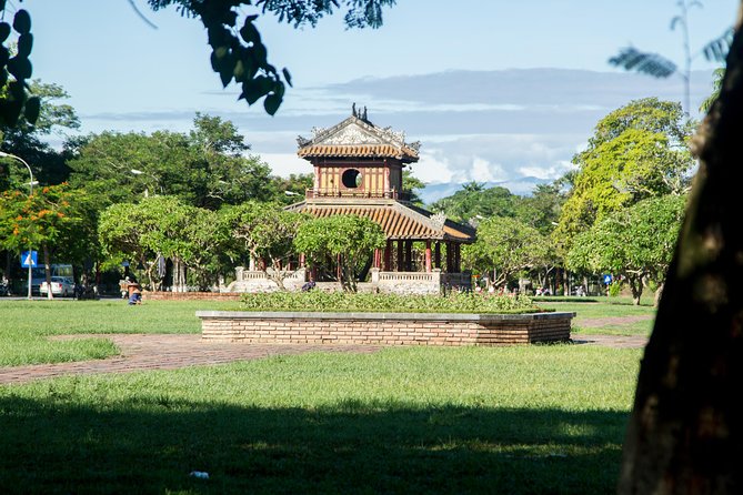 Imperial Hue And Hai Van Pass Full-day Tour - Pace, group size, and van comfort in a 15-person max tour