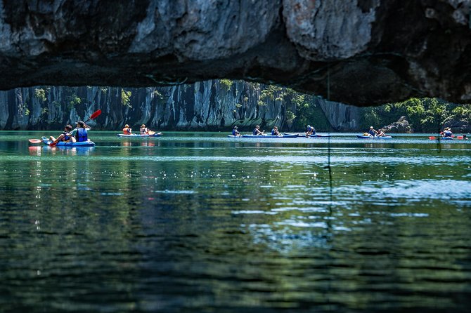 Kayaking at Lan Ha Bay - Double kayaks, guides, and lagoons hidden behind limestone cliffs