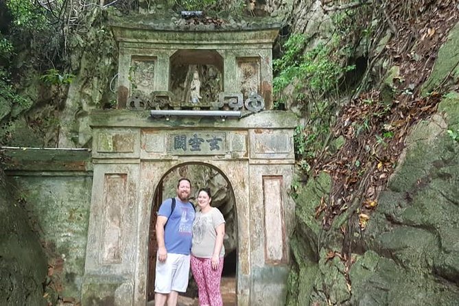 MARBLE MOUNTAIN-AM PHU Cave & HOI AN -Colourful Lantern Boat Ride - Hoi An Ancient Town in early night: Japanese Bridge, assembly halls, and heritage houses
