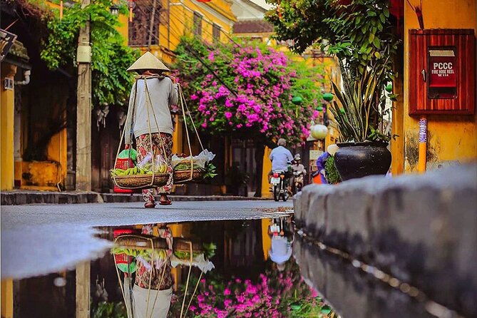 Marble Mountains and Hoi An Group Tour - Hoi An night market on Nguyen Hoang Street: snacks, lanterns, and browsing time