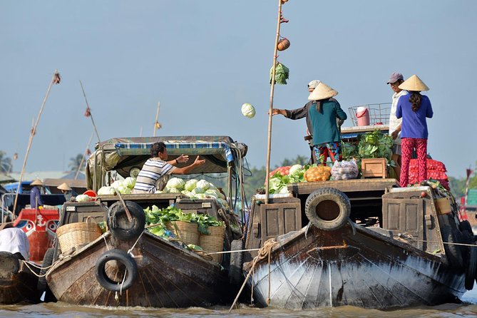 Mekong Delta 2-Day Tour: Floating Markets, Biking, Amazing Tour - Vinh Trang Pagoda: one hour, big statues, mixed styles