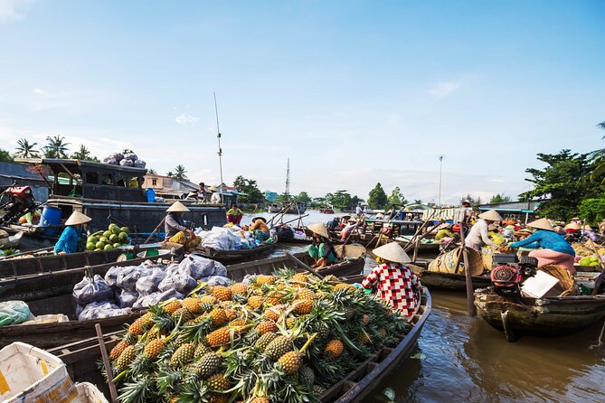 Mekong Delta & Cai Rang Floating Market 2-Day Tour from HCMC - Day 1: Vinh Trang Pagoda, My Tho river cruising, and coconut candy workshops