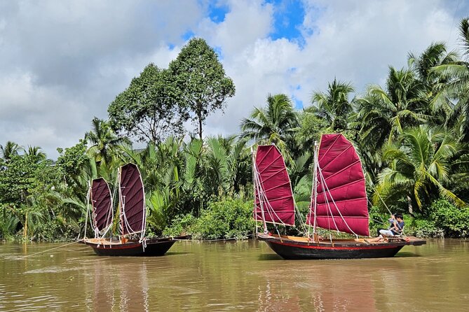 Mekong River Relaxing Sail boat cruise to Coconut Canals (1.5HRS) - Nhơn Thạnh canal cruising: winding tributary, coconut palms, and fruit trees