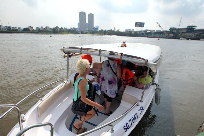 Morning CuChi Tunnels-Tapioca-Secret Traps Luxury Speedboat 2Ways - Getting picked up and moving efficiently in HCMC