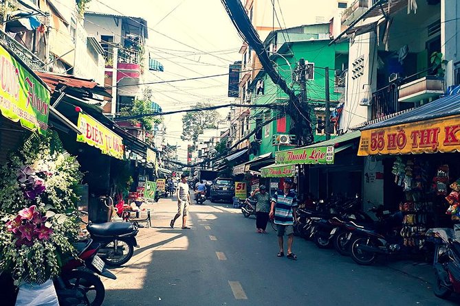 Morning Saigon Unseen+Street Food Tour with Ao Dai Riders Option - Vietnamese pancake with wild vegetables: a street food meal that feels local