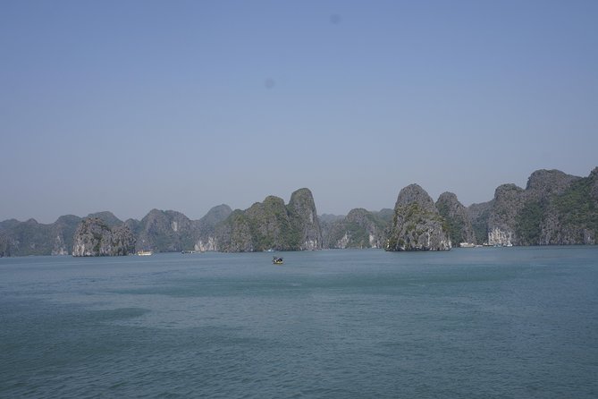 Most favorite full day boat tour with kayaking in Lan Ha bay, Ha Long bay - Morning in Lan Ha Bay: islands, fishing scenes, and the cave area