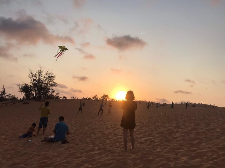 Mui Ne: Sunrise /Sunset Jeep Tour with Quad Bike ATV & Guide - Fishing village morning life, catch on shore, and boats waiting to go