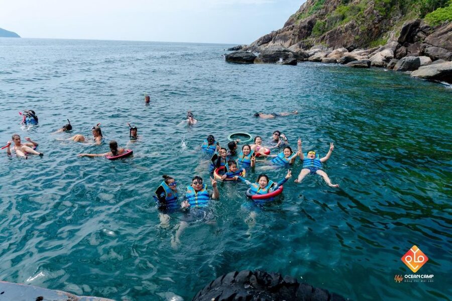 Nha Trang: Coral Reef Snorkeling and Floating Bar Party - Hon Mot cocktail time, guided fun, and the waterslide moment