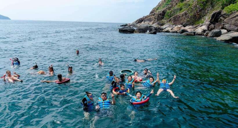 Nha Trang: Coral Reef Snorkeling, Mud Bath & Floating Bar - Con Sẻ Tre Tourist Village: Floating Bar Energy, SUP, and a Water Slide