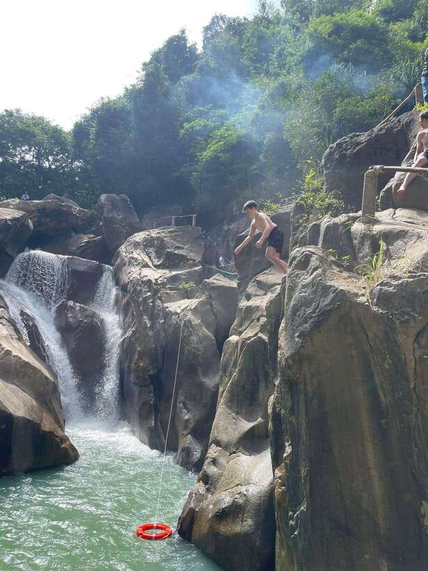 Nha Trang: Half-Day Group Tour of Ba Ho Waterfall by Car - The walk to the first lake: ropes, rocks, and first swim vibes
