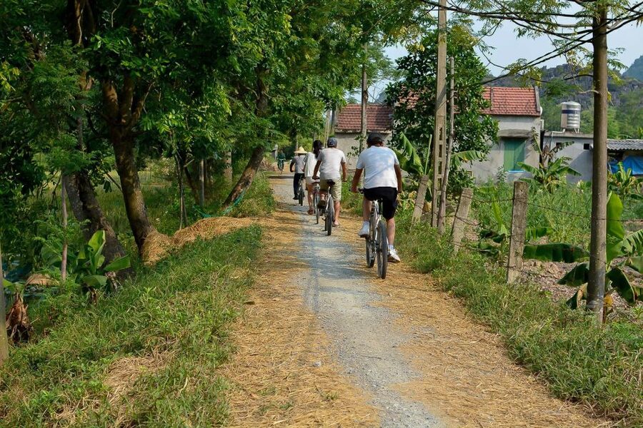 Ninh Binh Daily: Hoa Lu, Mua Cave, Tam Coc, Bike & Swimming - Pool time and sunset tea and fruit, the payoff after the effort