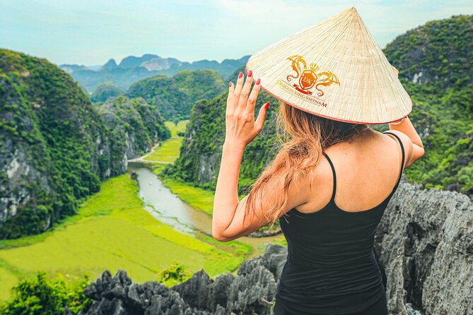 Ninh Binh Day Tour To Visit Hoa Lu - Trang An/Tam Coc - Mua Cave - Mua Cave steps: the big viewpoint over Ngo Dong River and Tam Coc