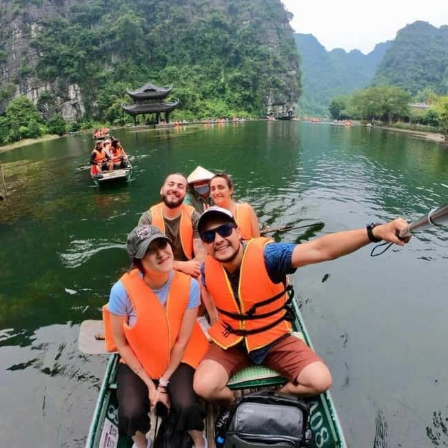 Ninh Binh: Mua Cave Hike, Trang An Boat & Village Bike Tour - Trang An Boat Ride Through Caves, Temples, and Karst Valleys