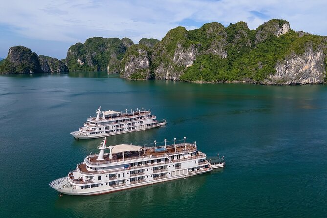 Paradise Elegance Cruise 2 days 1 night Halong Bay Tour - Tuan Chau check-in, electric-cart transfer, and how the day starts