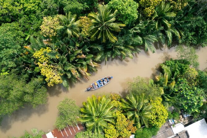 Premium Can Tho Small Canal Tour in Mekong Delta - Boat comfort and canopy coverage on a small motor-powered wooden boat