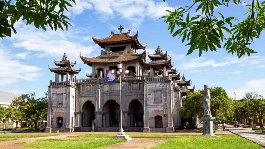 Private Car/Bus Renting Hanoi - Ninh Binh - Halong - Sapa... - Phat Diem Cathedral, stone and wood with European and Vietnamese vibes