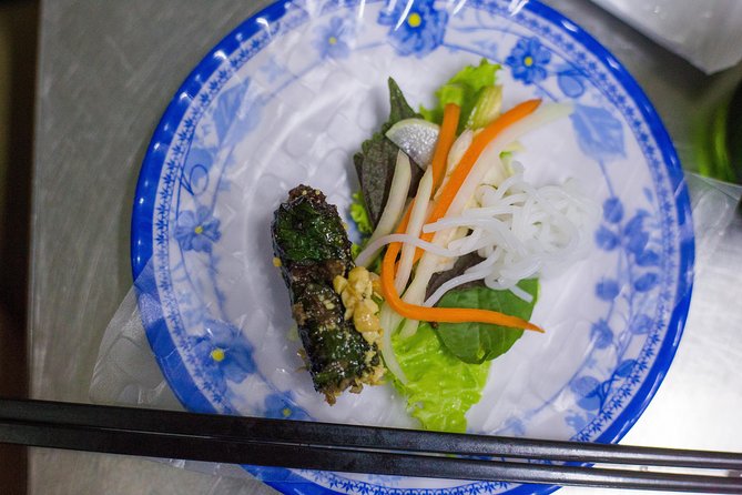 Private Street Food Evening Walking Tour in Ho Chi Minh City - Betel leaf beef, Trang Bang noodles, and codfish pie
