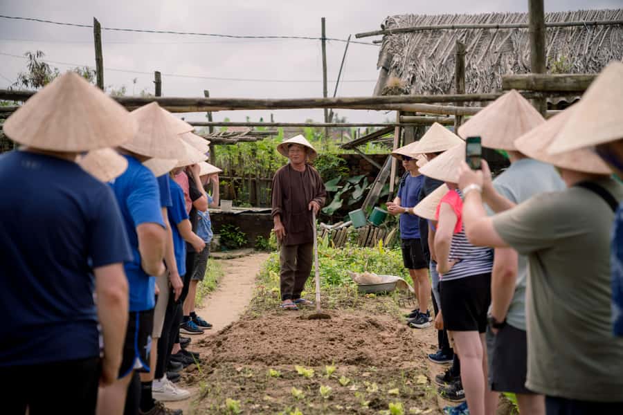 Rural Cycle, Market Tour, Basket Boat & Organic Farm Cooking - Joining local farmers in organic work, from manure to pest control