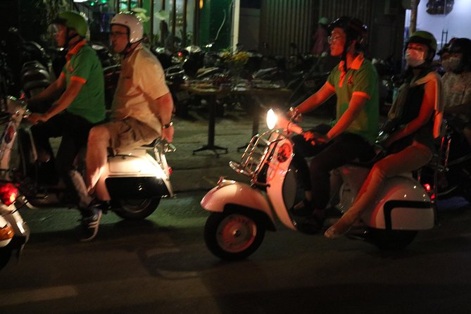 Saigon After Dark Vespa Street Food Tour + Live Music 4 hours - Stop 2: seafood dinner flow, then banh xeo and nem lui
