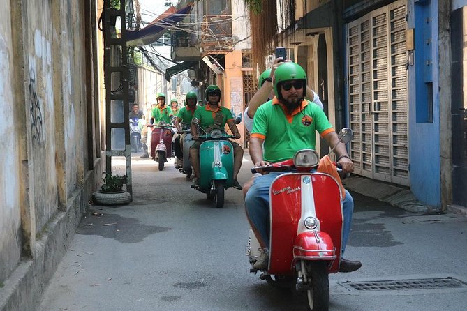 Saigon After Dark Vespa Street Food Tour + Live Music 4 hours - Stop 3: banana cake and the story behind the snack
