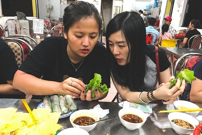 Saigon Afternoon Unseen Street Food by Scooter |Opt: Ao Dai Rider - Guides at the Wheel: English, Humor, and Real Explanations
