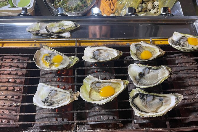 Saigon By Night and Street Food By Motorbike | Opt: Ao Dai Riders - Stop 3: Nguyen Trai Street for the sights between meals