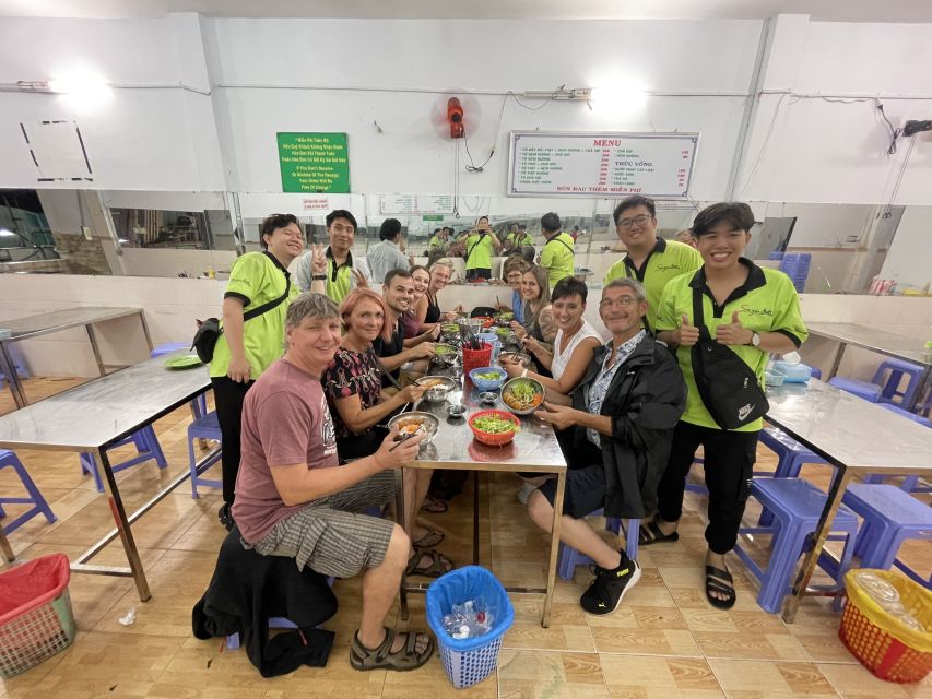 Saigon: Day-Night Sights & Local Food Tour l Female Option - District 1 starts you off with grilled pork vermicelli and spring rolls
