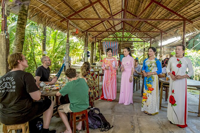 Small-Group Mekong Delta Day Trip: Boat Ride, Cottages & Pagoda - Ben Tre workshop stops: coconut candy, honey tea, and how it is made