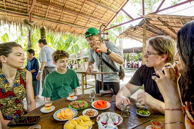 Small-Group Mekong Delta Day Trip: Boat Ride, Cottages & Pagoda - Lang Xanh Ben Tre lunch: five courses plus local music