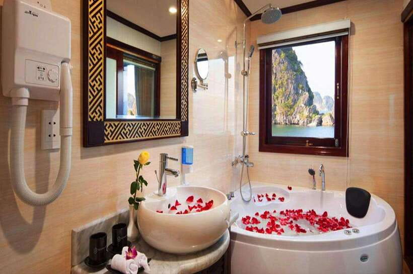 Swan Cruises: Bai Tu Long Bay 2 Days 1 Night - Day 2: Sunrise viewing, Thien Canh Son Cave, and lunch before you head back