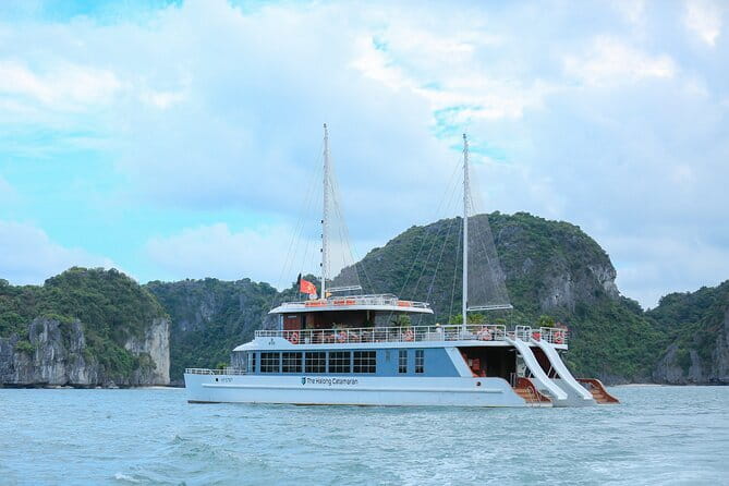The Catba Catamaran Day Tour Lan Ha Bay Cruise Trips - Sunset party on Cat Ba Island: snacks, drinks, music, and views