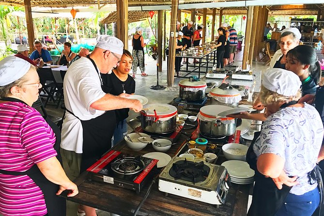 Traditional Cooking Class with Basket Boat Ride and market Tour - Herbal foot soak and shoulder massage: the heat reset before cooking