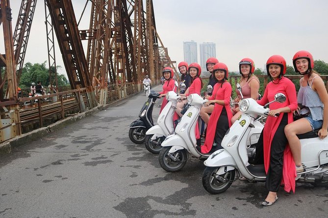 Vespa City Tour &Train Street Female With Ao Dai Riders 4,5 Hours - Getting set up in the hotel lobby: safety gear and Ao Dai drivers