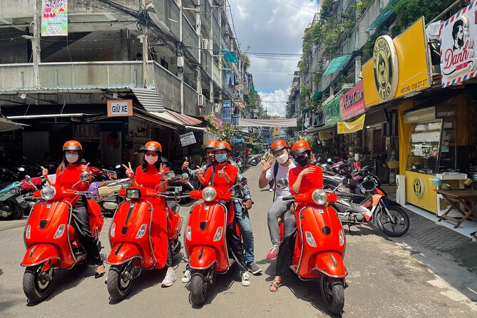 Vespa Female Ao Dai riders Night Street Food + See Train Street - Female-led Vespa night rides: what the experience really feels like