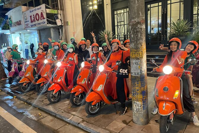 Vespa Female Ao Dai riders Night Street Food + See Train Street - Opera House at night and a Bahn Xeo break you’ll remember