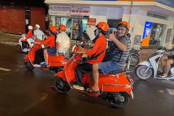 Vespa Female Ao Dai riders Night Street Food + See Train Street - Duong Tau and Train Street: seeing the rails up close